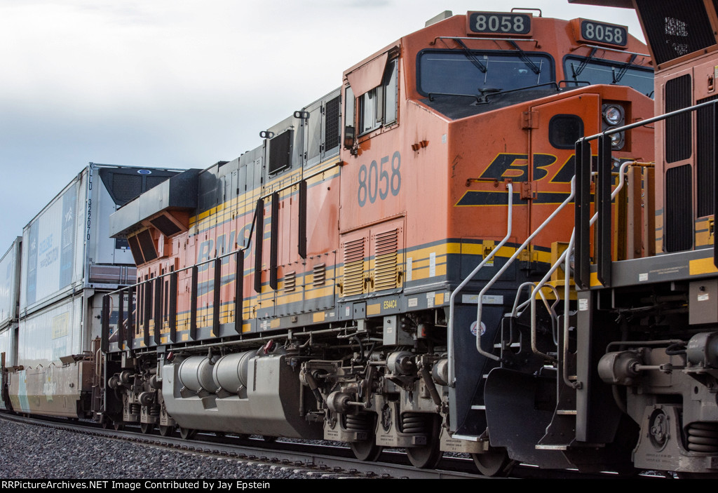 BNSF 8058 trails on an eastbound intermodal 